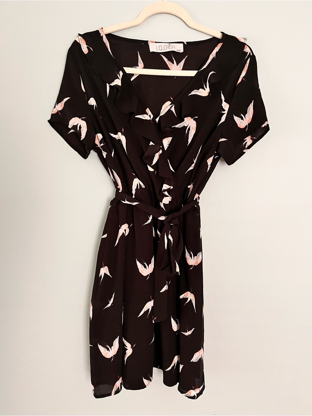 Liquorish Black Mini Wrap Dress with Pink Bird Pattern